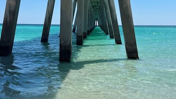 On the beach, sun-loungers