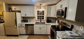 House, 4 Bedrooms | Private kitchen | Fridge, dishwasher, coffee/tea maker, toaster