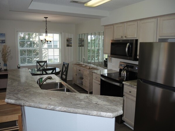 Condo, 1 Bedroom | Private kitchen | Fridge, dishwasher, coffee/tea maker