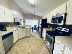 Villa, 5 Bedrooms | Private kitchen - Golf Views By The Pool! Southern Dunes Golf Home 5 Bedroom Villa by RedAwning (Haines City)