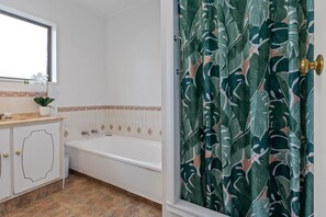 Bathtub, hair dryer