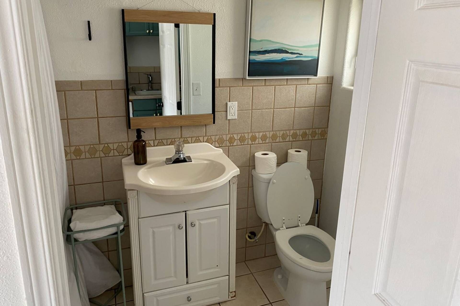 Shower, hair dryer, towels, shampoo