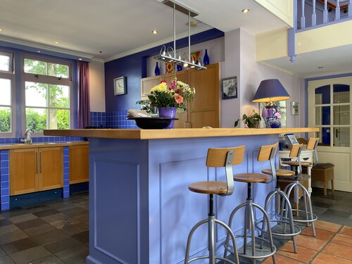 Colourful farmhouse in the middle of nature