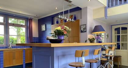 Colourful farmhouse in the middle of nature