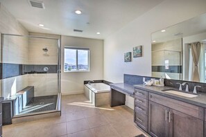 Bathtub, hair dryer, towels, soap