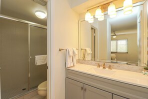 Bathtub, hair dryer, towels, soap