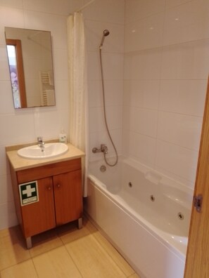 Combined shower/bathtub, jetted bath, hair dryer, bidet