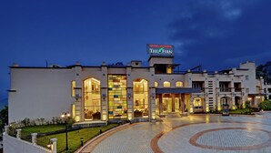 A hotel with a large entrance, a sign reading "Grand Victoria The Fern," and a paved courtyard. - Grand Victoria The Fern Resort & Spa, Panchgani (Wai)