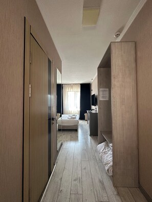 Habitación individual | 1 habitación, ropa de cama de alta calidad y minibar