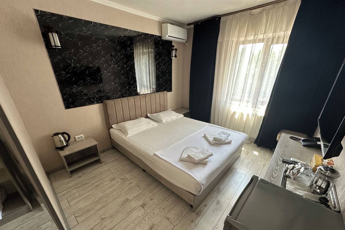 Habitación individual | 1 habitación, ropa de cama de alta calidad y minibar