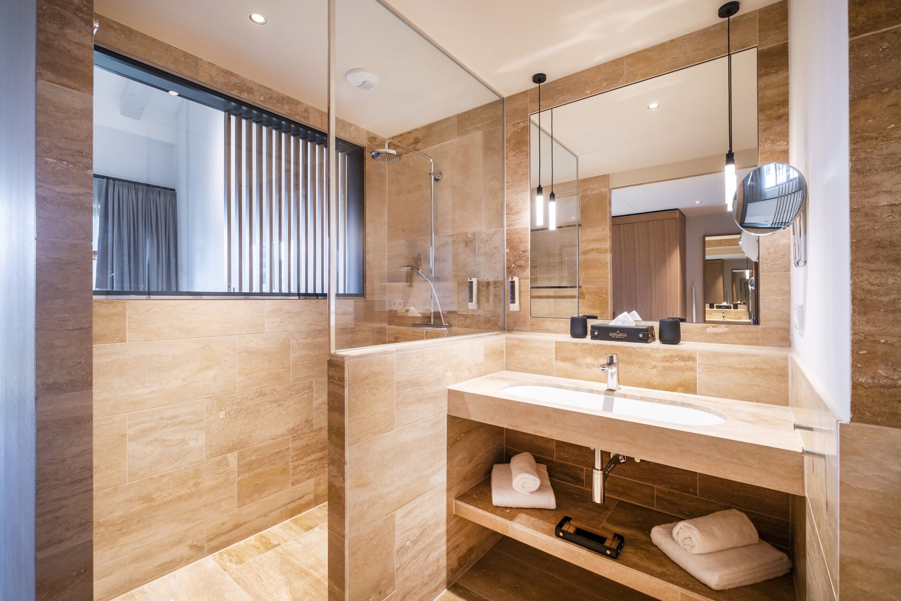 maisonette-suite | bathroom | shower, rainfall showerhead, hair dryer, slippers