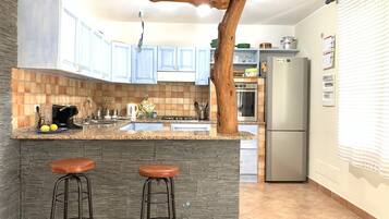 Réfrigérateur, four, plaque de cuisson, lave-vaisselle