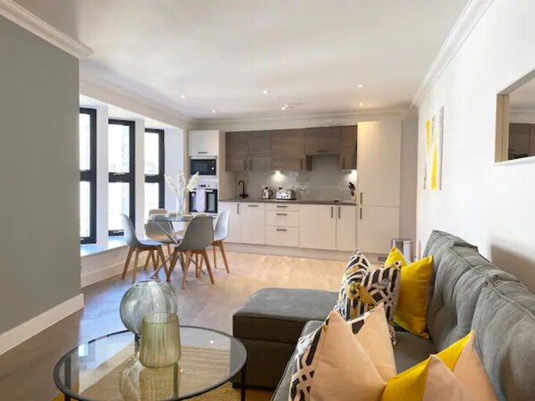 Apartamento Deluxe | Zona de estar