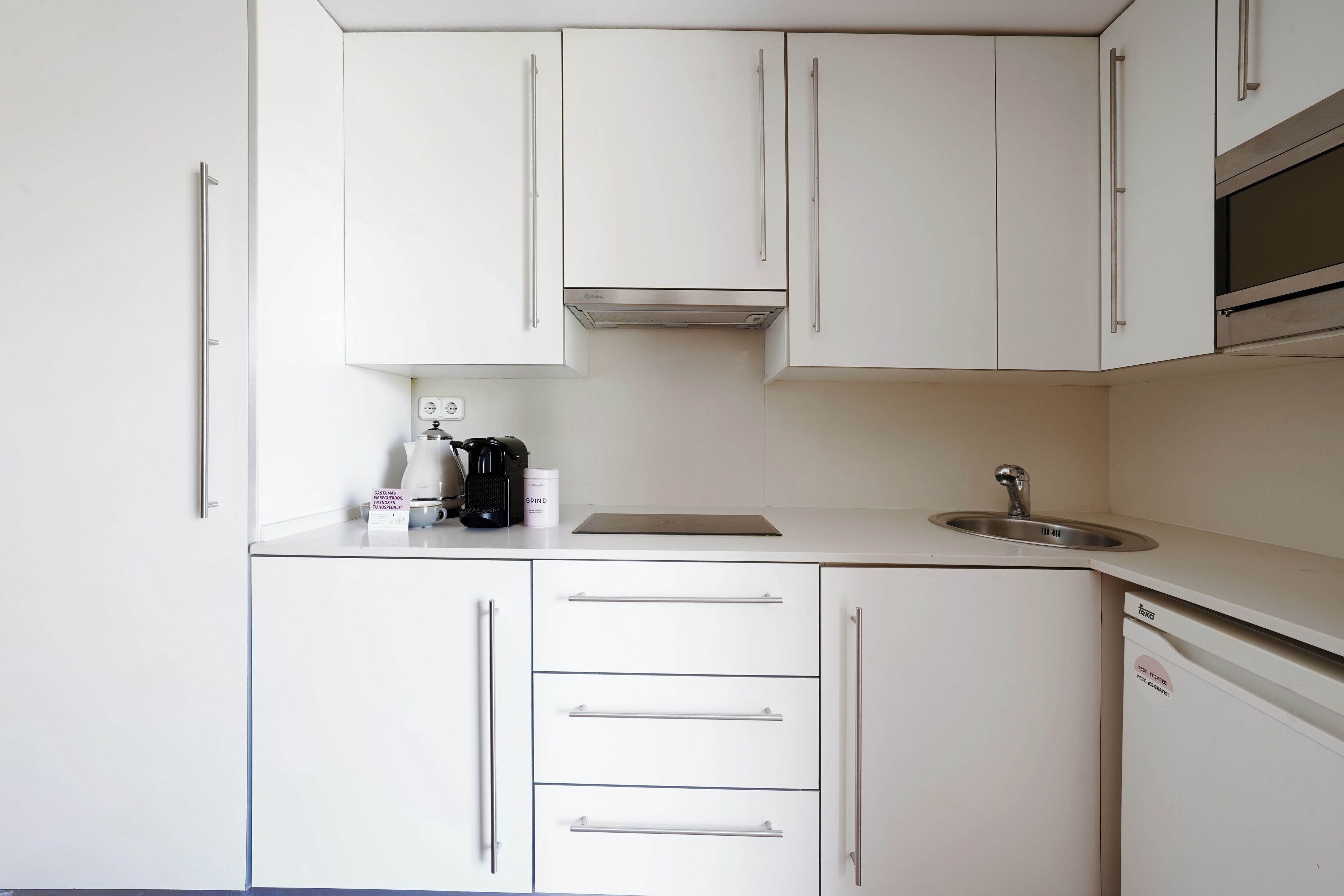 Fridge, microwave, stovetop, coffee/tea maker