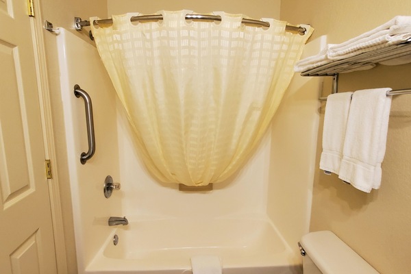 Combined shower/tub, shampoo