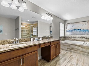 Combined shower/tub, jetted tub, hair dryer, towels