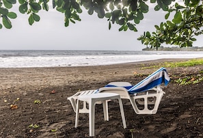 On the beach, sun loungers