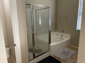 Combined shower/bathtub