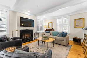 Smart TV, fireplace, books