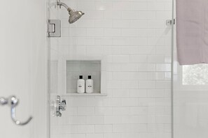 Bathtub, hair dryer, towels, soap