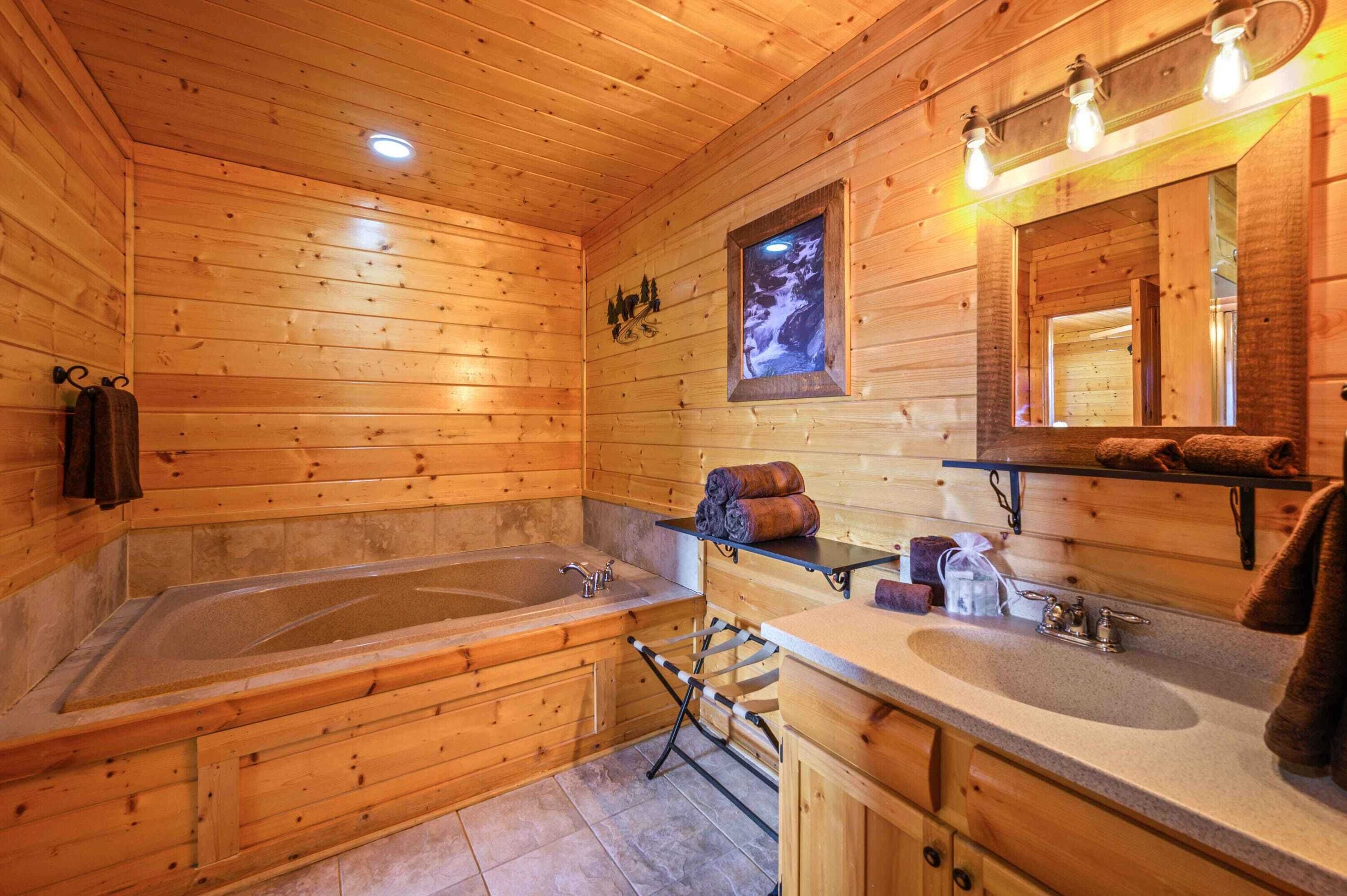Master bathroom has a shower and jacuzzi tub