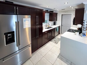 Fridge, microwave, oven, stovetop - SOFA HOUSE: Walk downtown/beach. EPIC pool home! (Delray Beach)