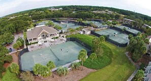 Surrounded by lush greenery, this sports complex offers multiple tennis courts.
