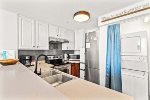 Fridge, microwave, oven, stovetop - Seychelles 1006 - Charming Gulf Front Condo (Panama City Beach)