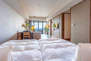 Ocean View Garden Suite,13 years or older, Non Smoking | Down comforters, free minibar, in-room safe, desk