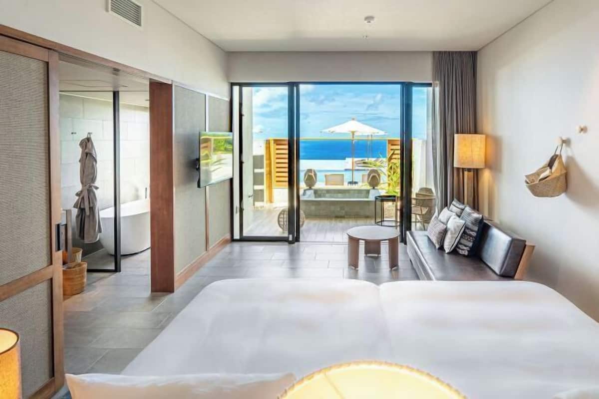 1 habitación, cubrecamas y minibar con artículos gratuitos
