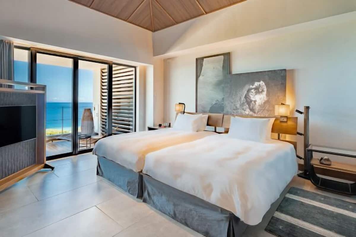 1 habitación, cubrecamas y minibar con artículos gratuitos