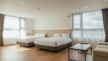 Quadruple Room, Ocean View | Desk, laptop workspace, soundproofing, free WiFi