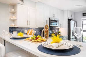 Fridge, microwave, oven, stovetop - Magazine-Worthy Waterfront Condo ~Heated Pool & Spa w/Resort Amenities & WiFi; Walk to Shops/Dining (Marco Island)