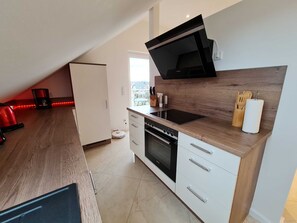 Fridge, oven, dishwasher, high chair