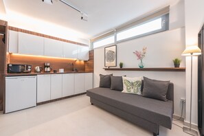 City Apartment | Living area | TV