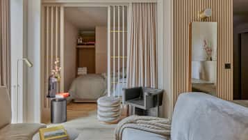 Two Bedroom Suite | Living area | 42-inch flat-screen TV with digital channels, TV