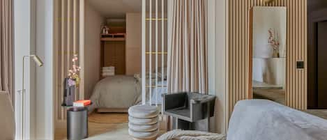 Two Bedroom Suite | Living area | 42-inch flat-screen TV with digital channels, TV