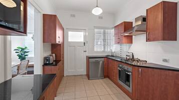 Full-sized fridge, microwave, oven, dishwasher