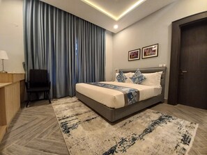 Business Suite | Frette Italian sheets, premium bedding, memory foam beds, in-room safe - SOLACE SUITS & HOMES (Abuja)