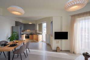 Superior Apartment | Living area | 42-inch flat-screen TV with satellite channels, TV - Elia Residences (Chania)