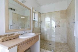 Bathtub, hair dryer, towels