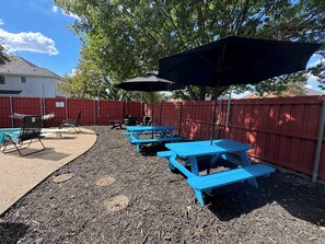 Outdoor dining - Grand 6BR/2.5B Home with Pool, Grill & Game Room (Grand Prairie)