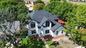 Exterior - Grand 6BR/2.5B Home with Pool, Grill & Game Room (Grand Prairie)