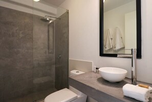 Bathtub, hair dryer, towels