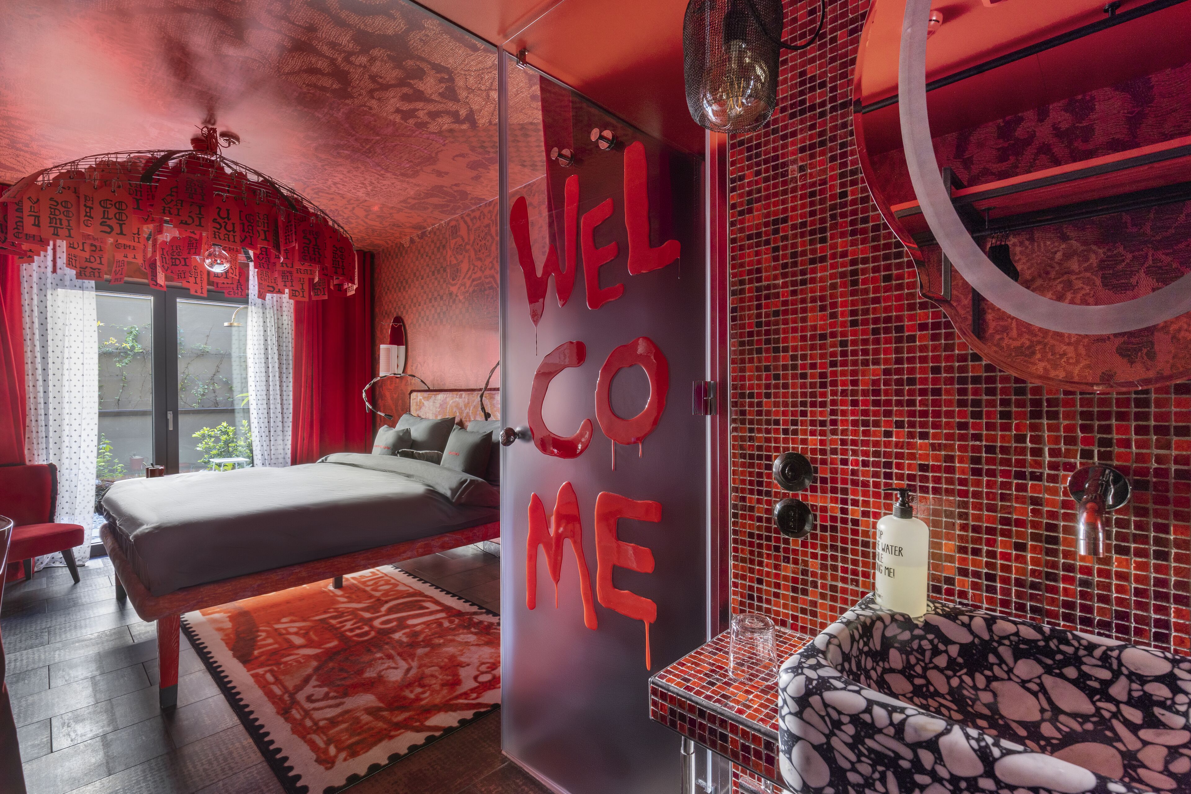 large rosso with private garden | bathroom | shower, rainfall showerhead, hair dryer, towels