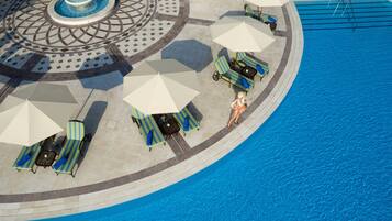 Indoor pool, outdoor pool, open 7:00 AM to 6:00 PM, pool umbrellas