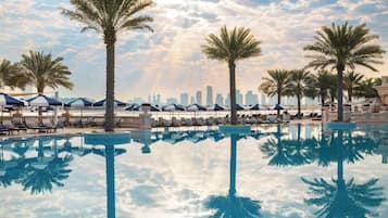 Indoor pool, outdoor pool, open 7:00 AM to 6:00 PM, pool umbrellas