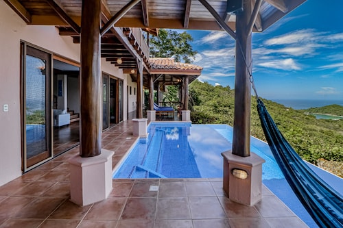 Beautiful jungle home by Islita Beach with ocean view & private infinity pool