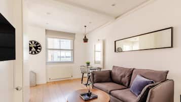 Design Apartment | Living area | Flat-screen TV