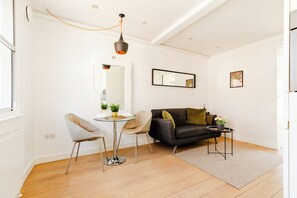 Design Apartment | Living area | Flat-screen TV